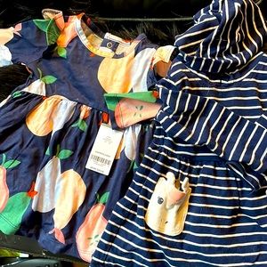 Two carters baby dresses